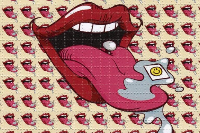 Illustrated LSD blotter art featuring a cartoon mouth and tongue with a smiley-faced tab — symbolizing the use of legal LSD analogs like 1S-LSD in scientific research.
